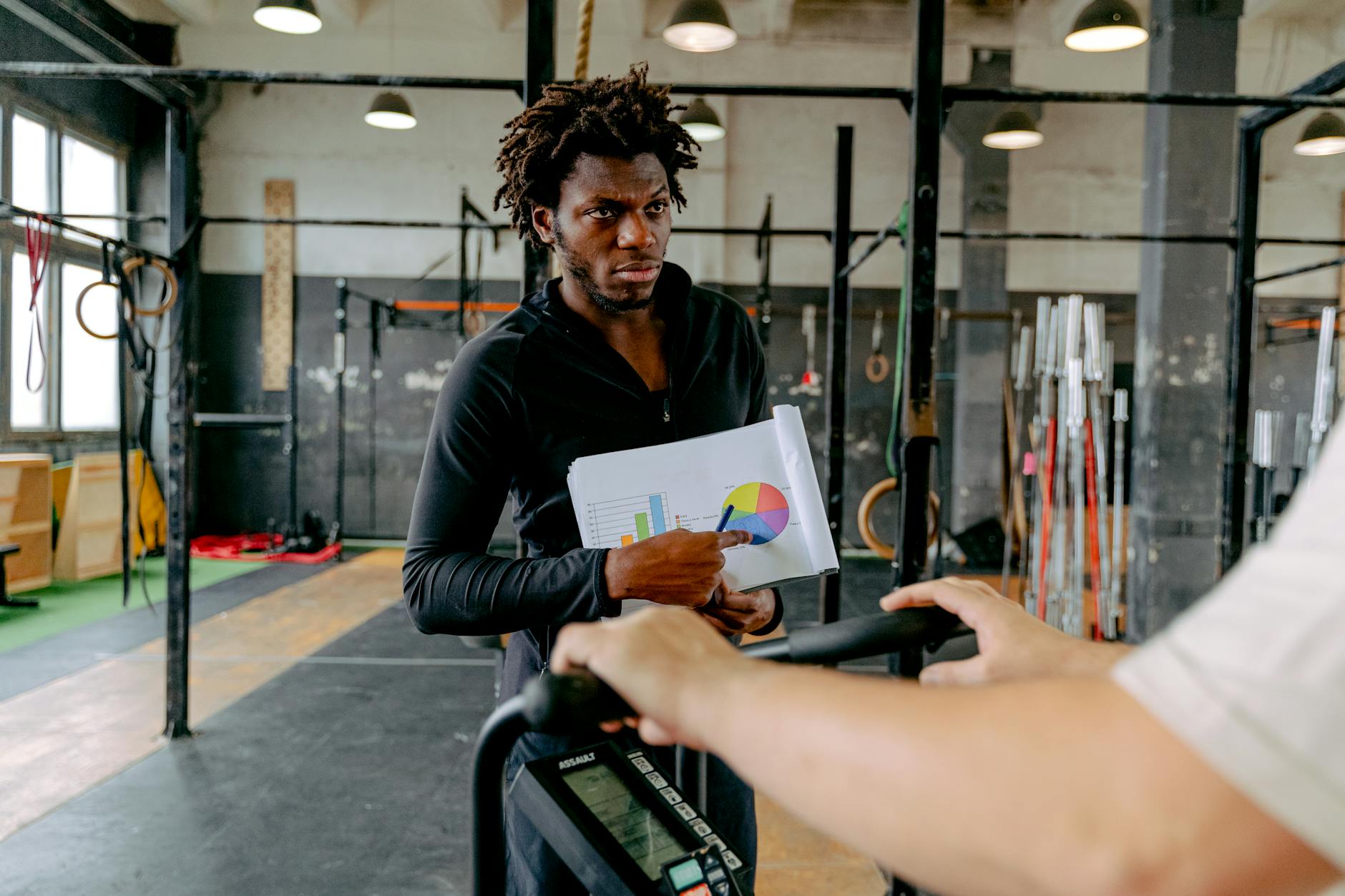 AJ coaching a client with hands-on, intentional guidance