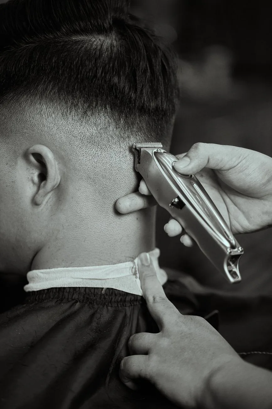 Black and white close-up of a barber fade, used in the homepage mockup