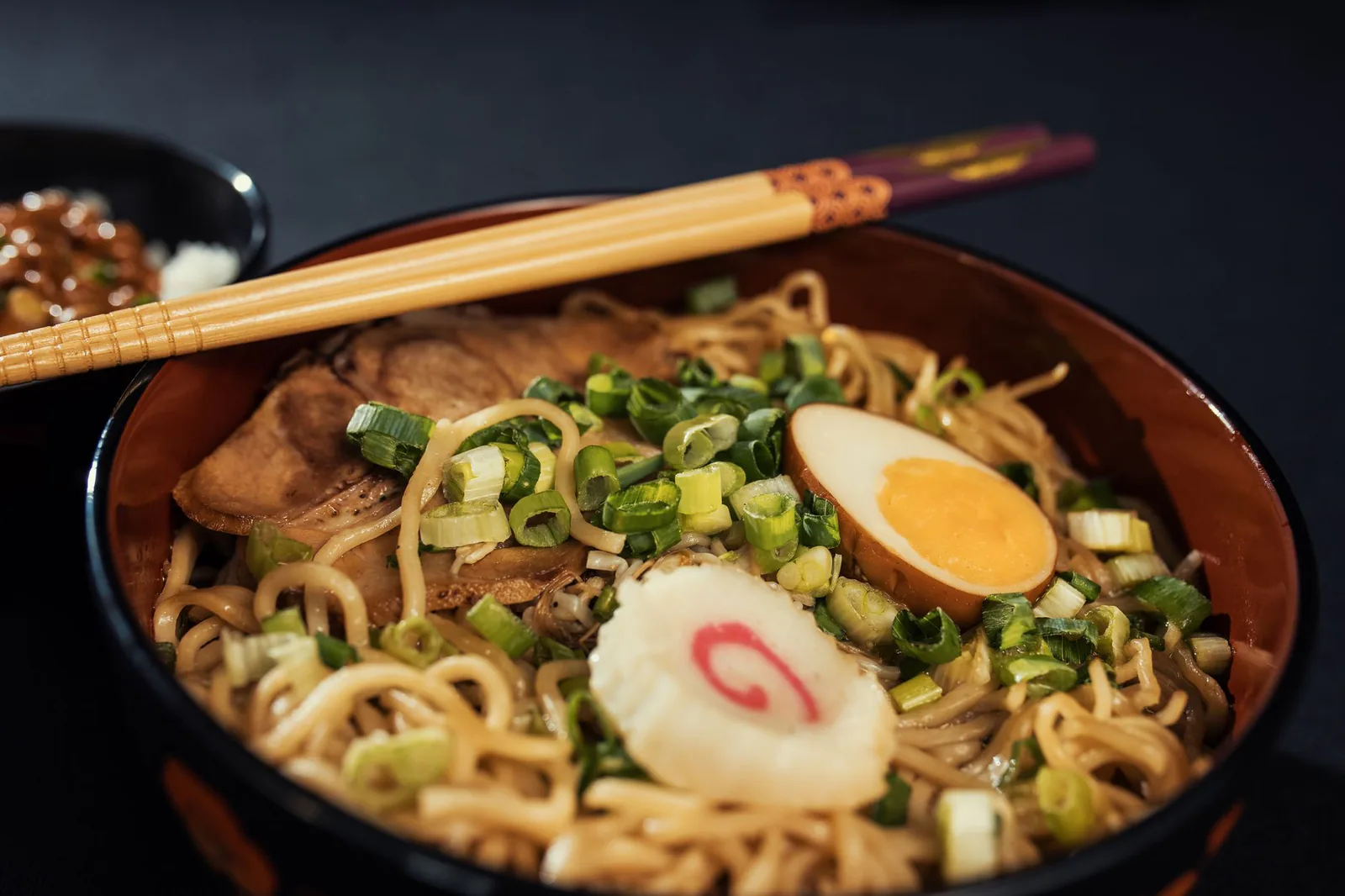 Traditional ramen with boiled egg and narutomaki