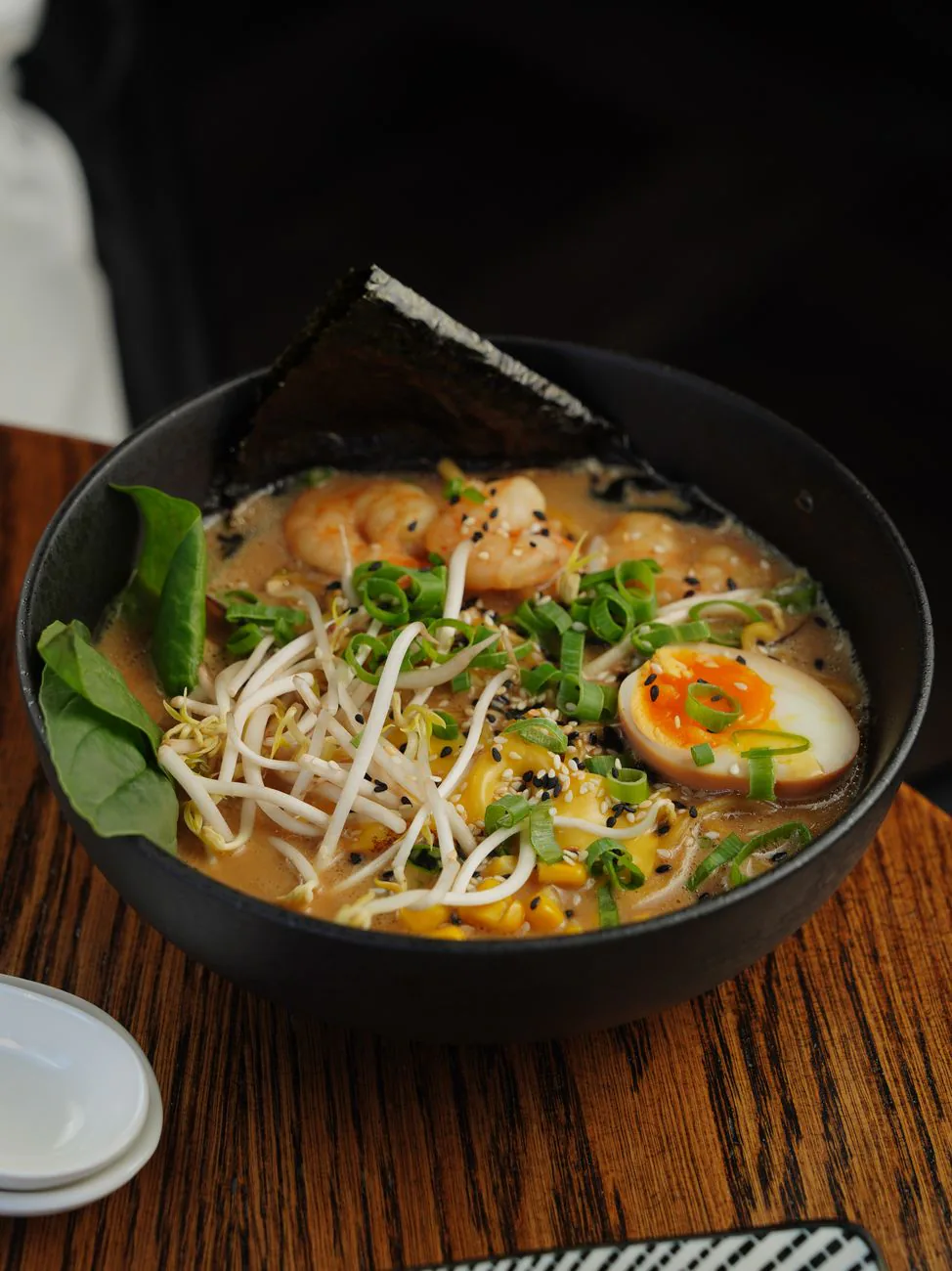 Ramen bowl with egg, sprouts and shrimp