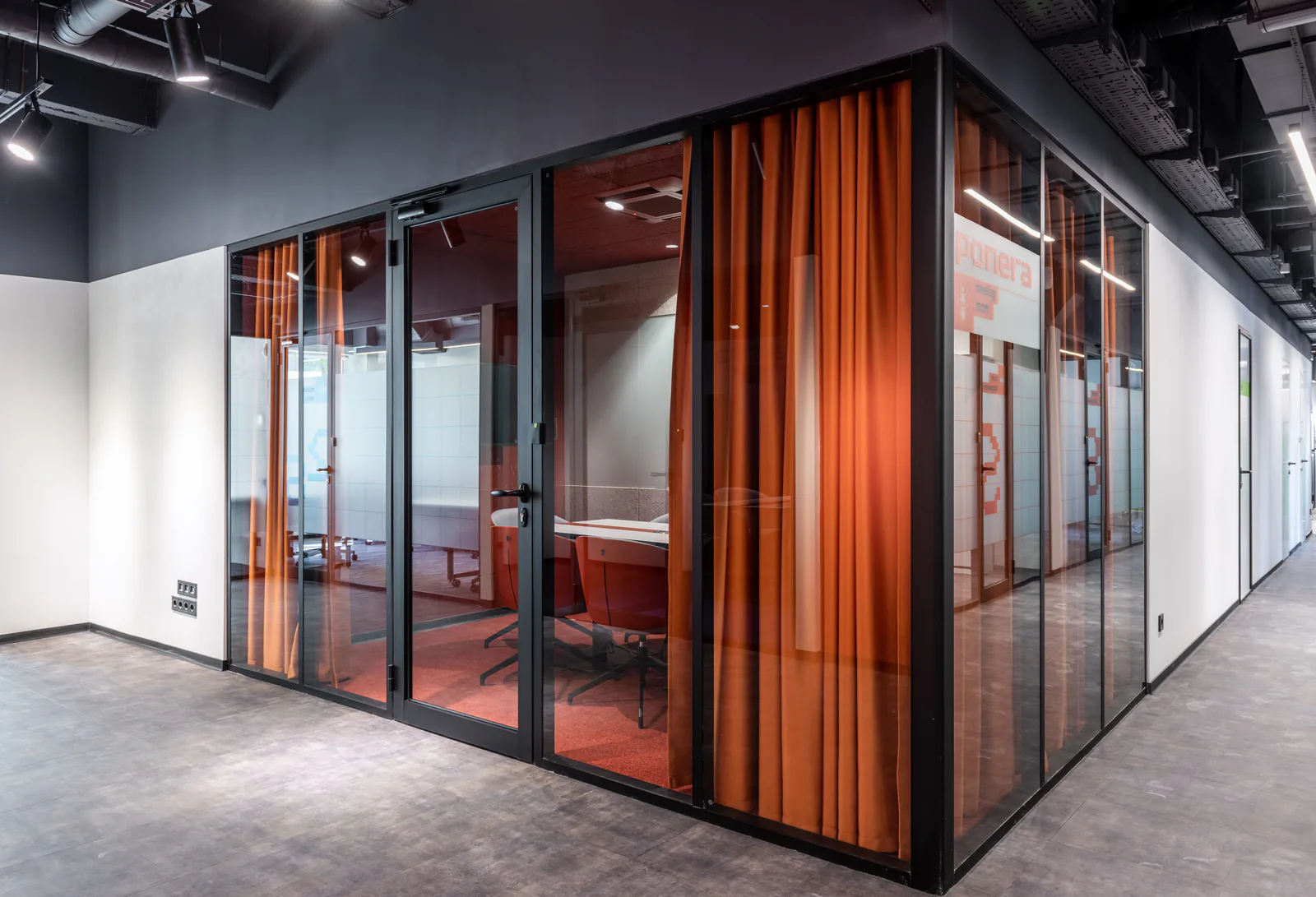 Modern commercial office interior with glass walls