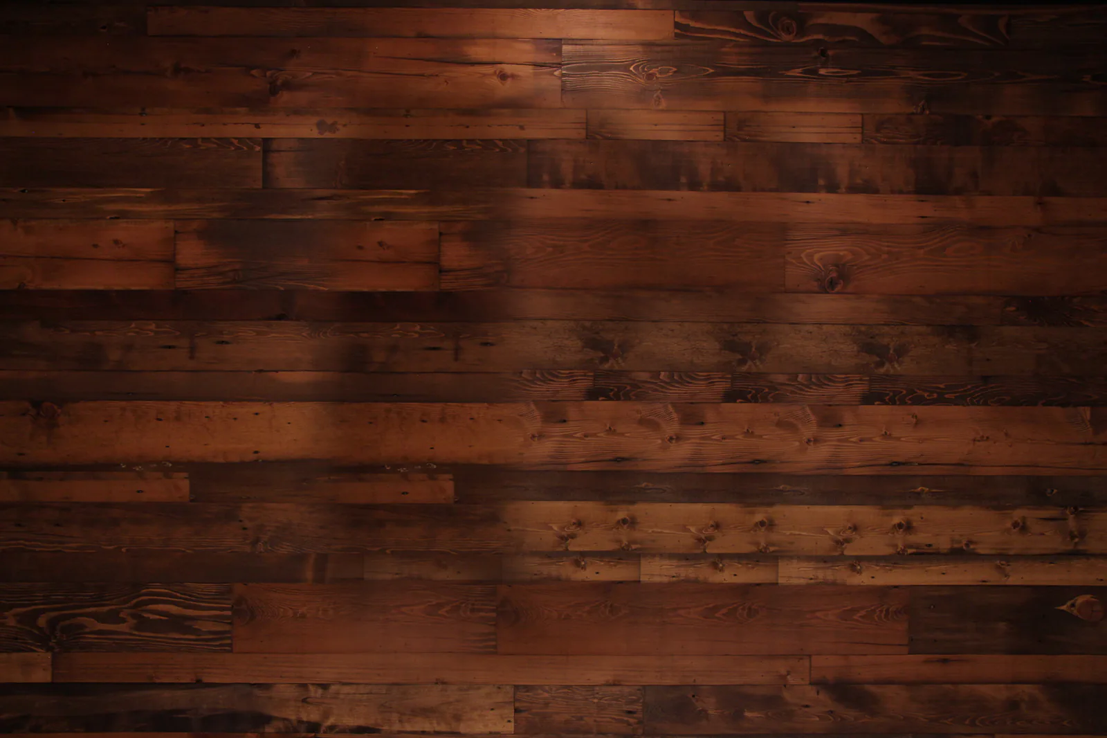 Inside District 9 Draught Haus with beer taps and bar seating