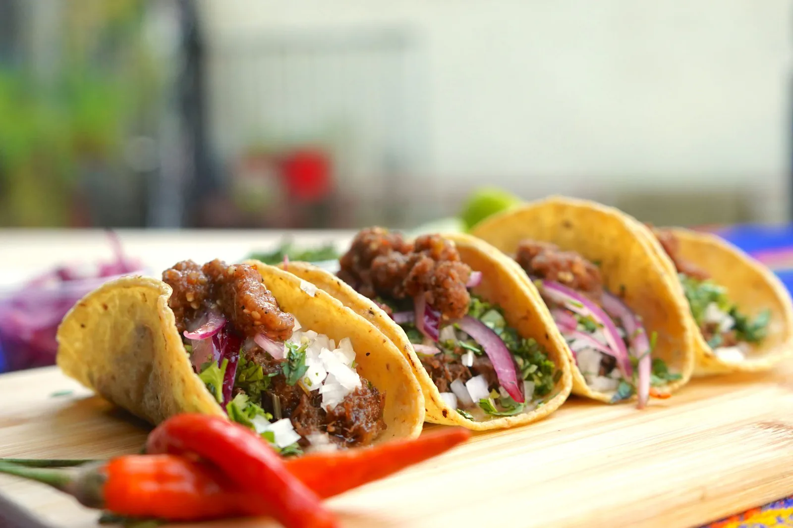 Beef tacos with onion and cilantro