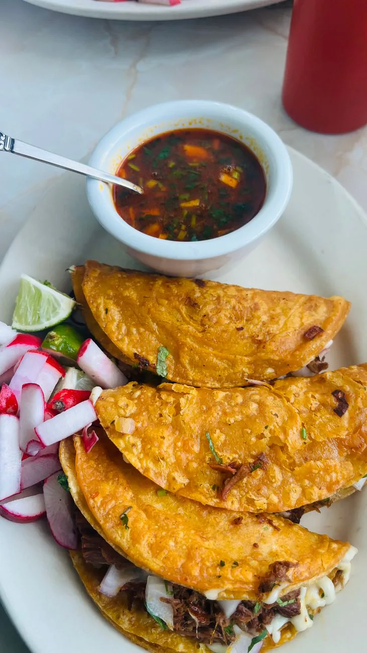 Birria tacos with consomme