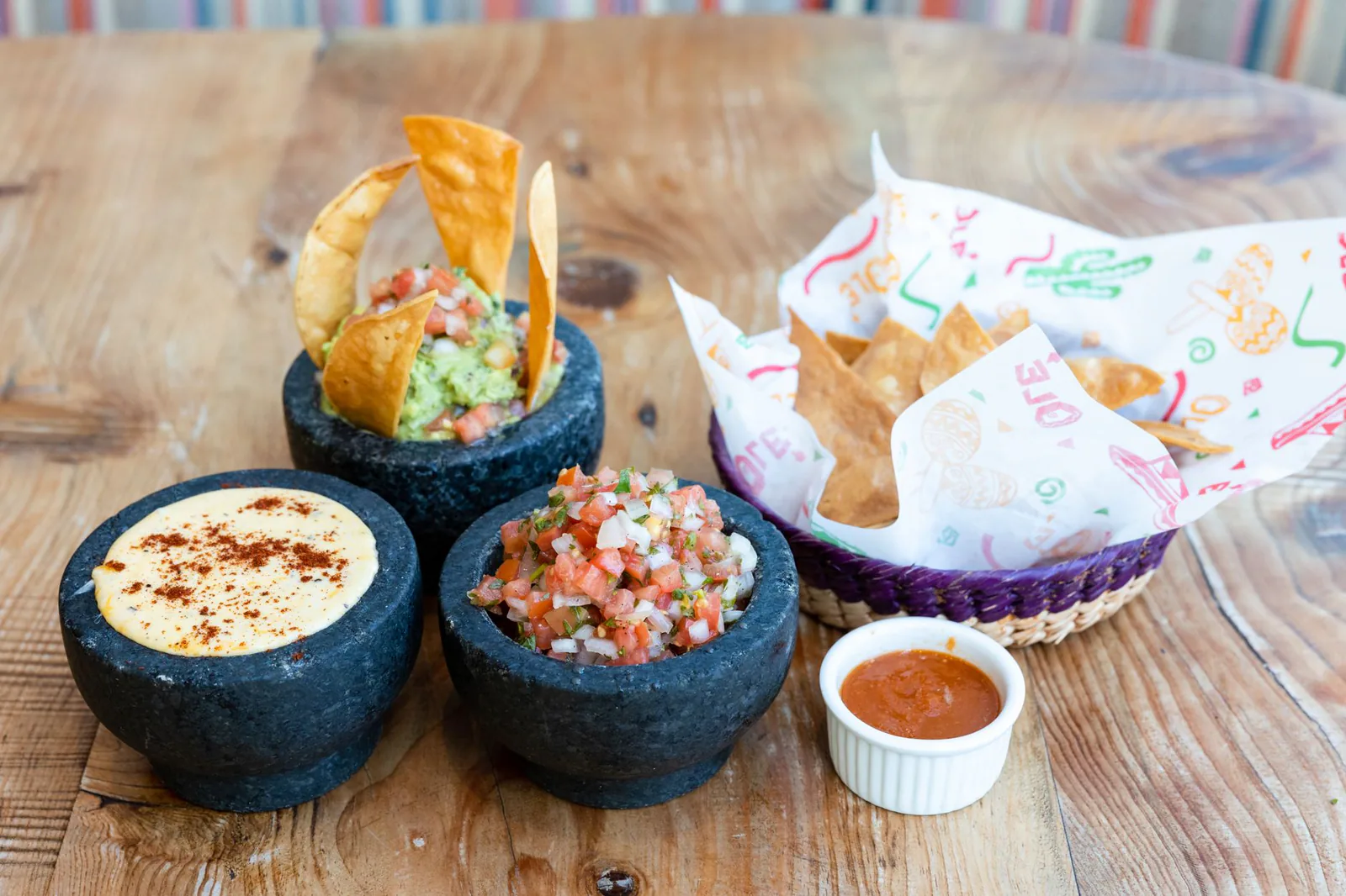 Guacamole, salsa and queso with tortilla chips