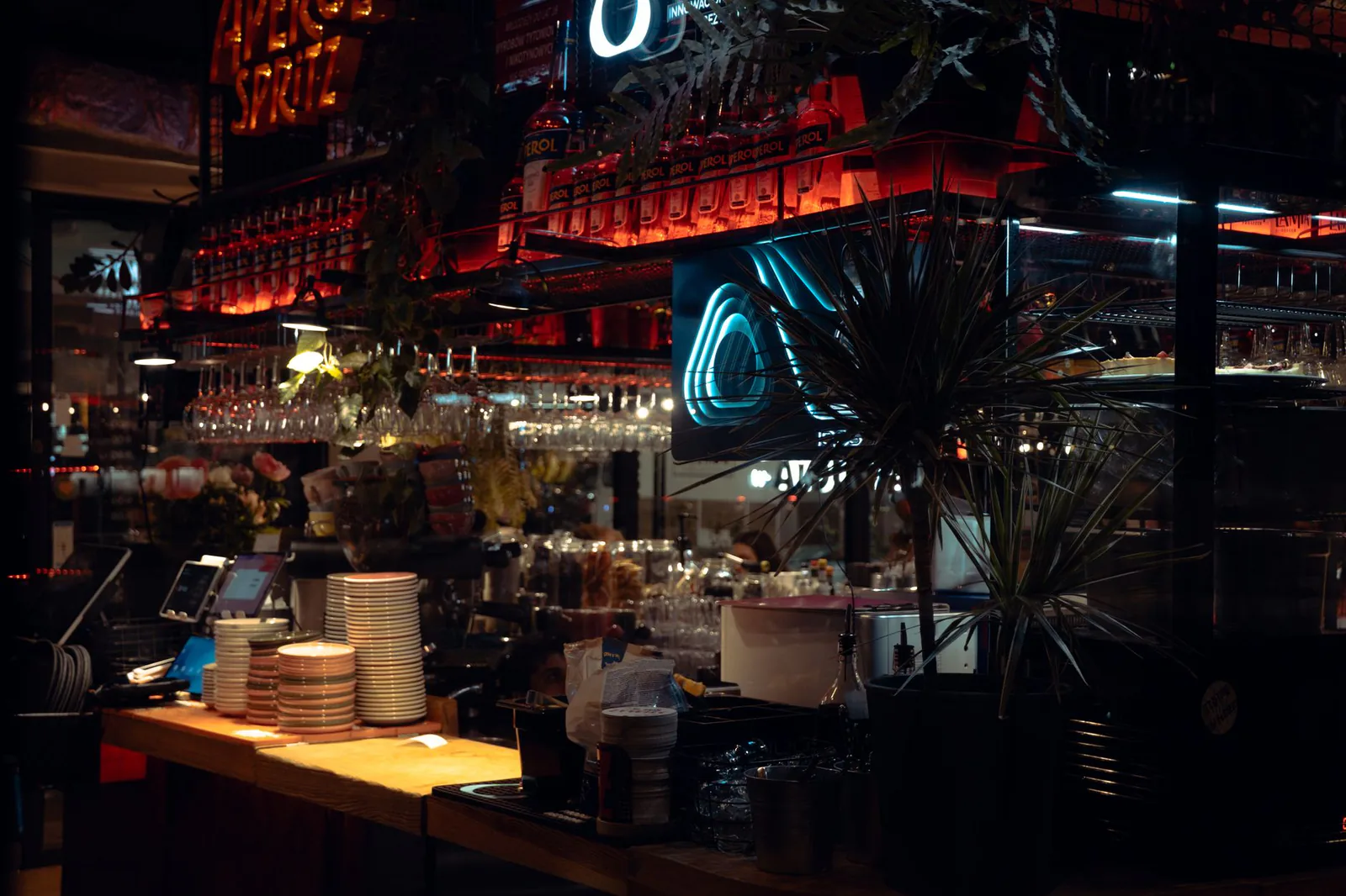 The bar glowing warm at night
