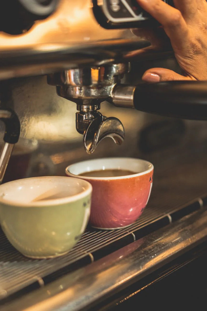 Fresh Cuban espresso pulled at the cafe counter