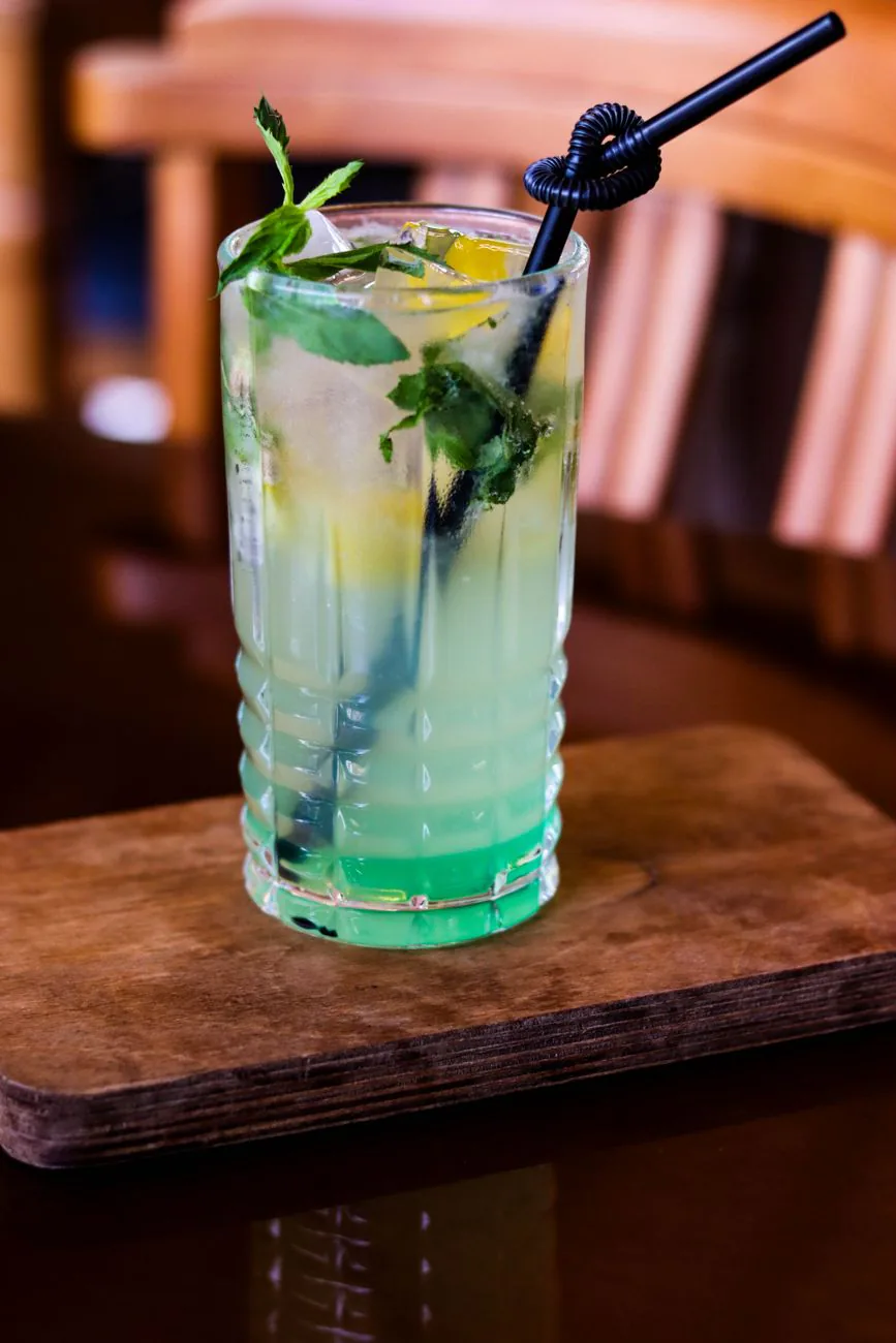 Mojito garnished with fresh mint and lime