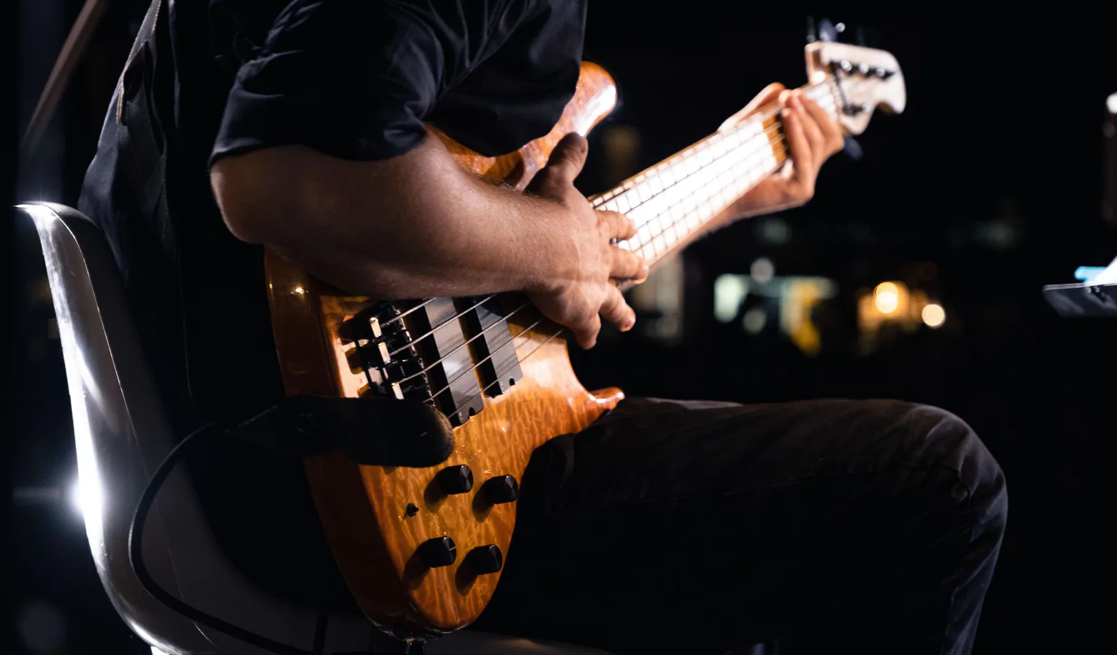 Close-up of live guitar at a night performance
