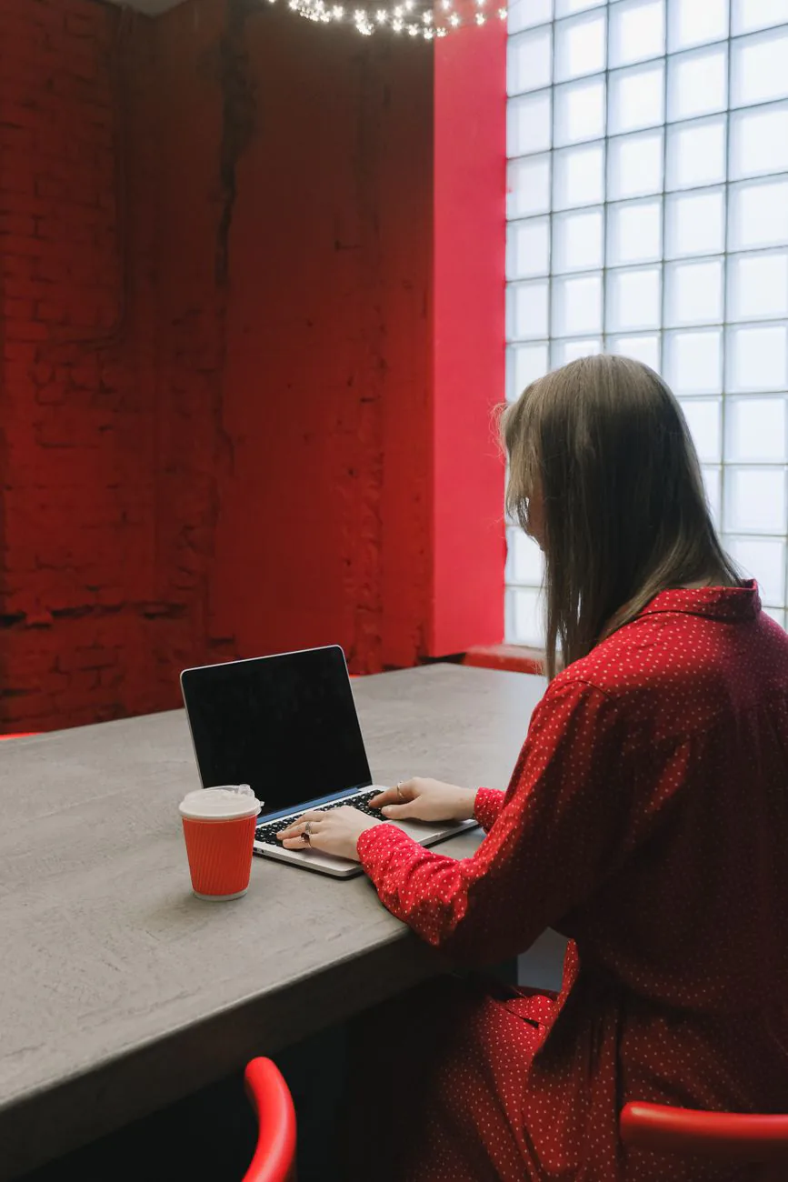 Studio founder reviewing a client project on laptop