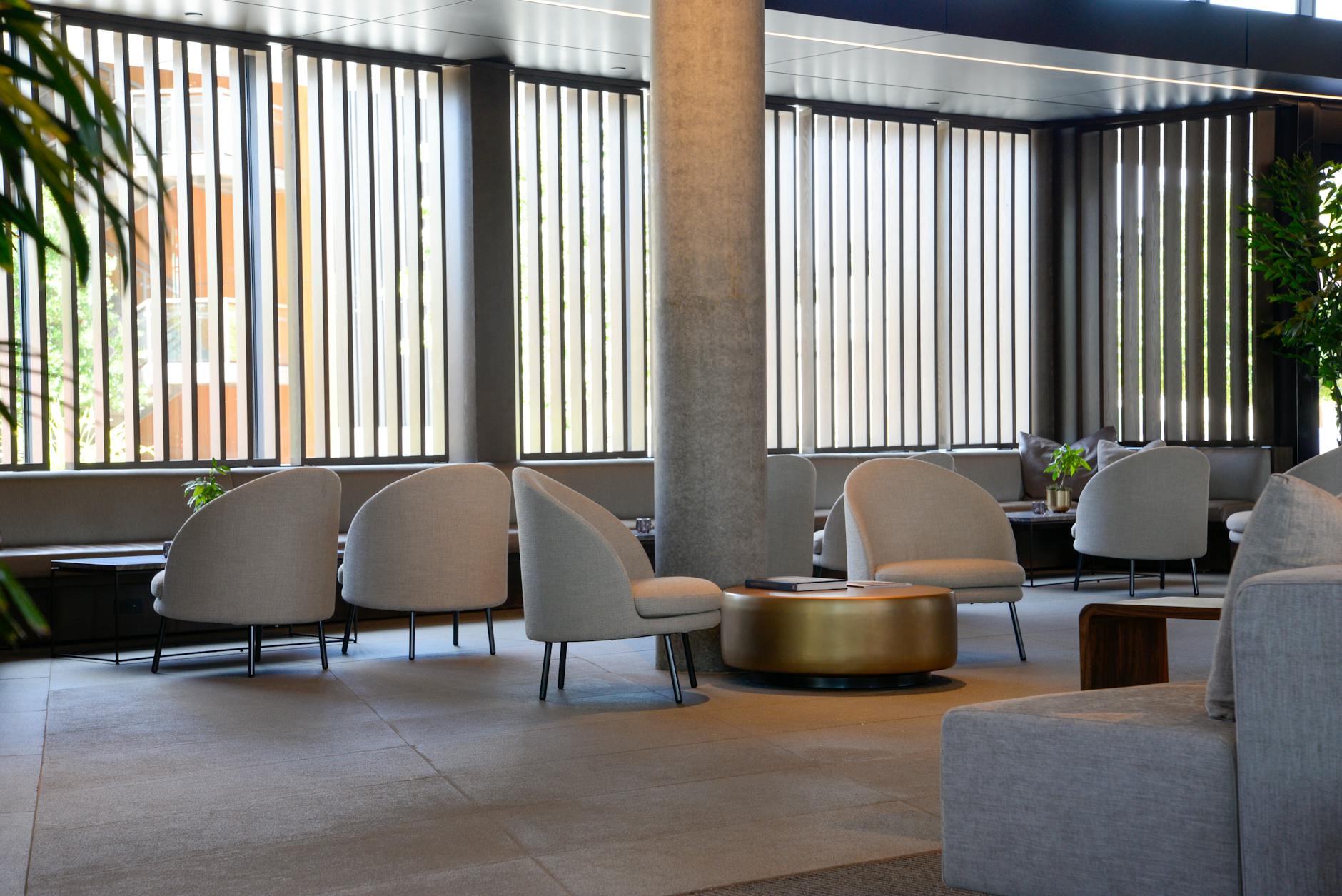 Spacious premium hospitality lounge with natural light and modern architecture