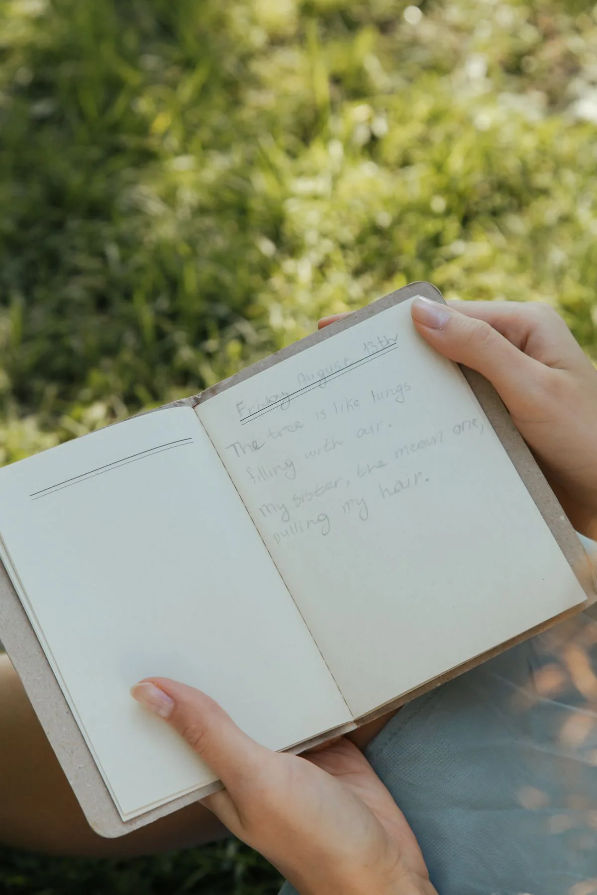 Journaling outdoors in warm natural light