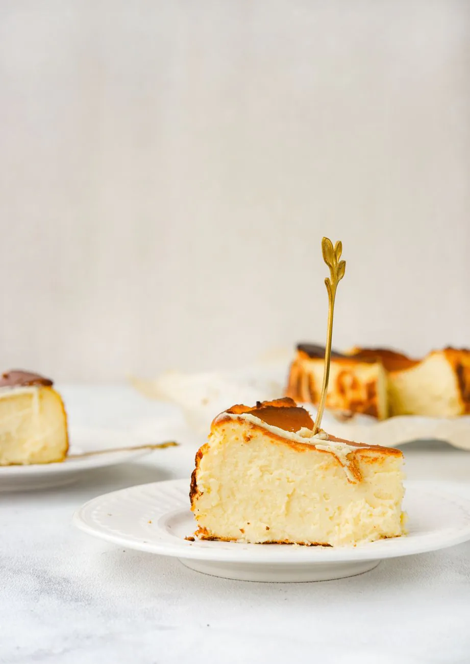 Slice of Basque cheesecake on a plate