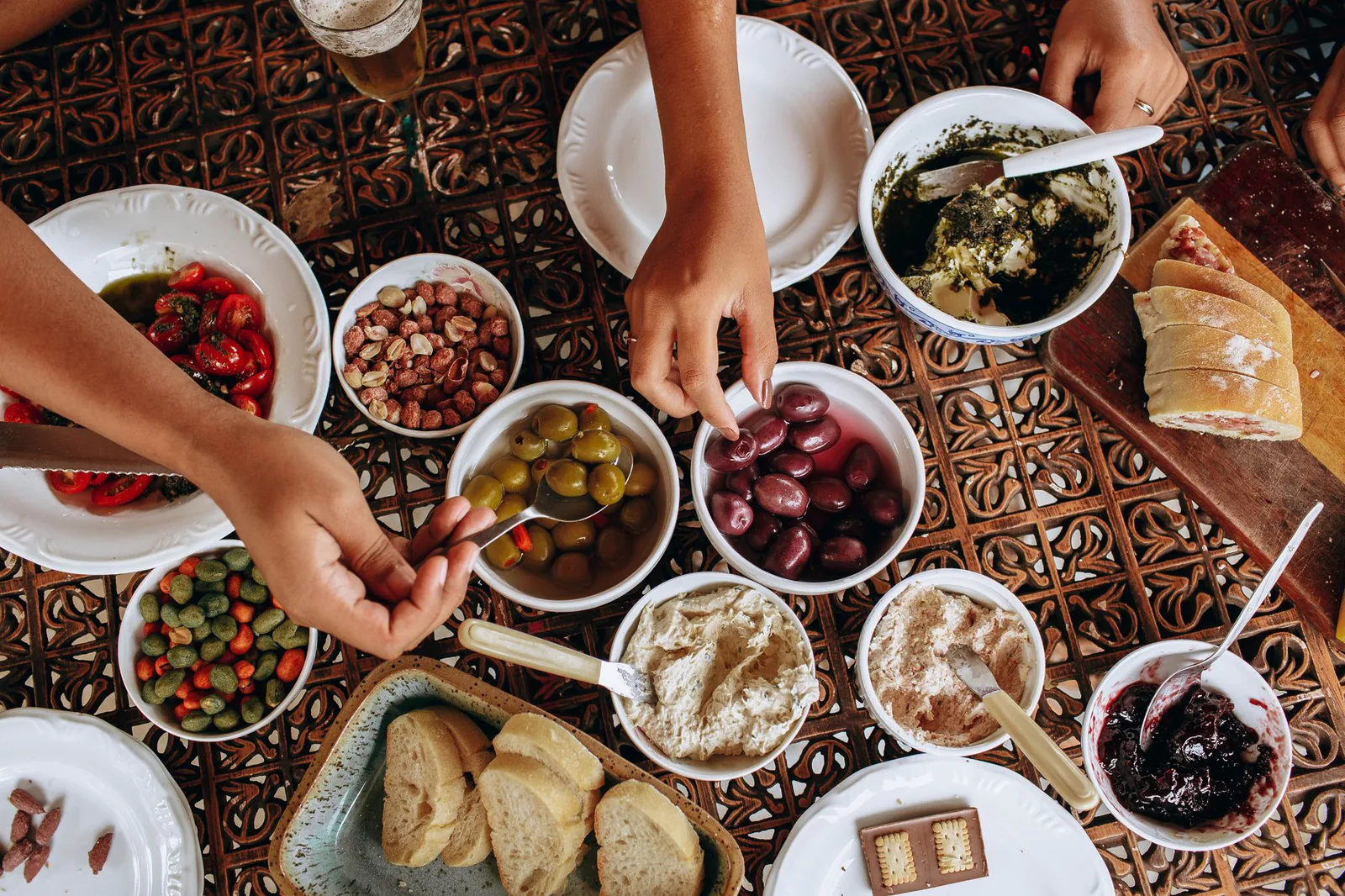 Family-style Mediterranean spread with shared plates