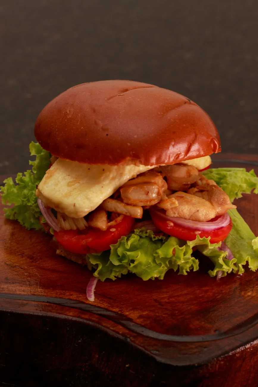 Gourmet chicken sandwich with greens