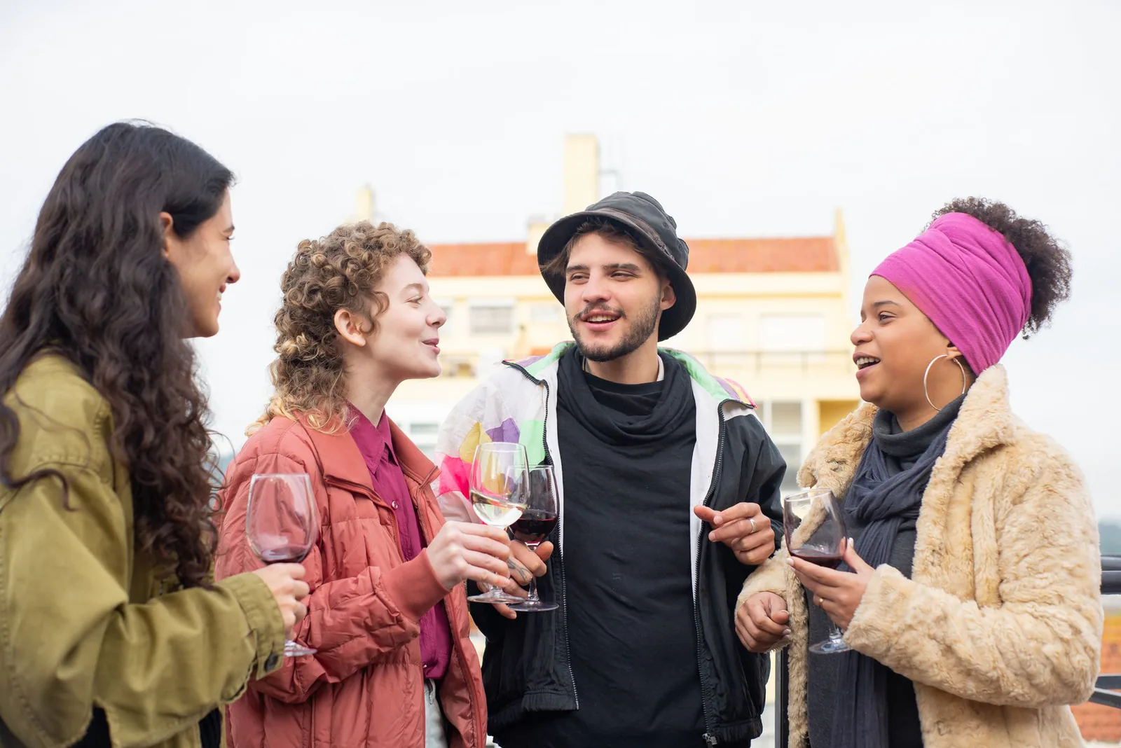 Friends sharing wine and conversation together