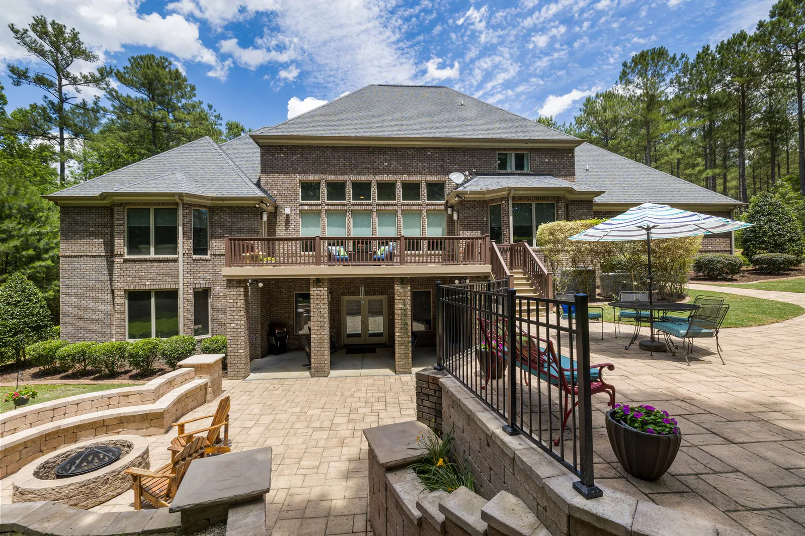 Backyard concrete patio set up for outdoor living and entertaining