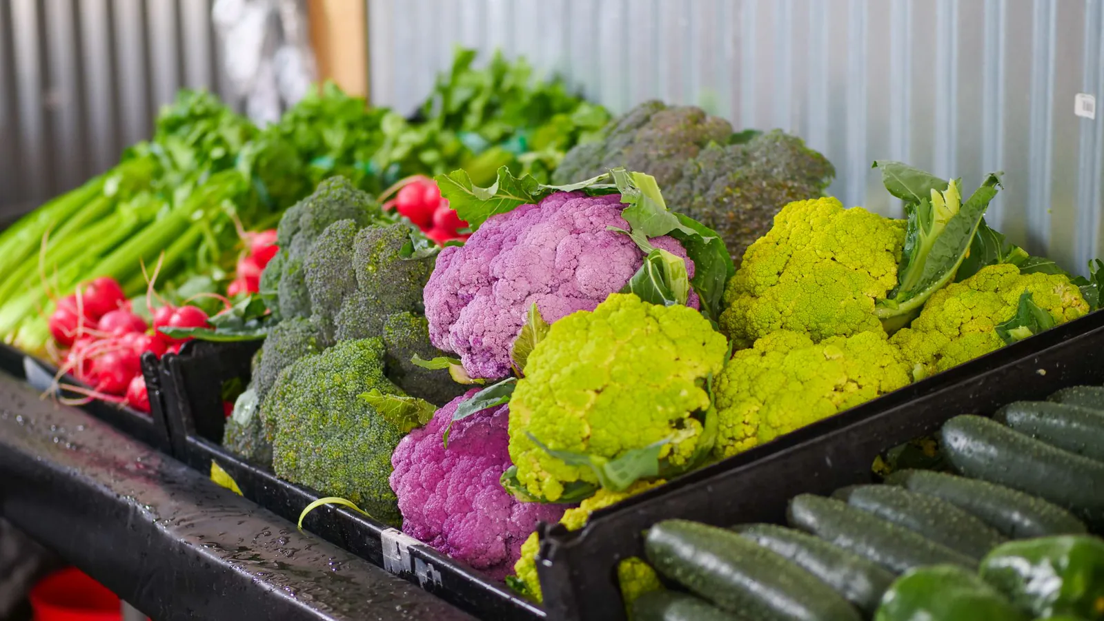 Colorful organic cauliflower and radishes at the market