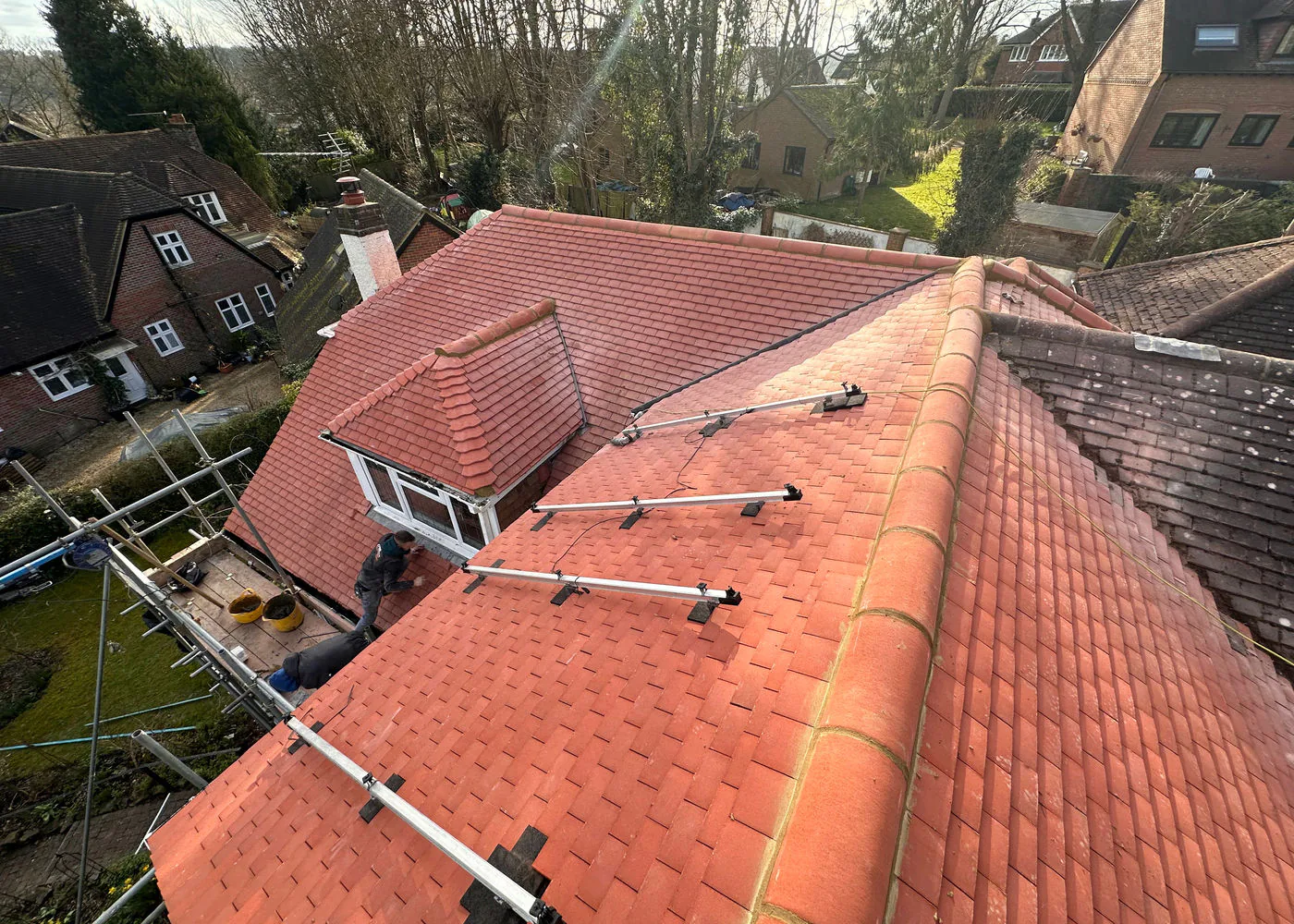 Roof repair and re-tiling work in progress