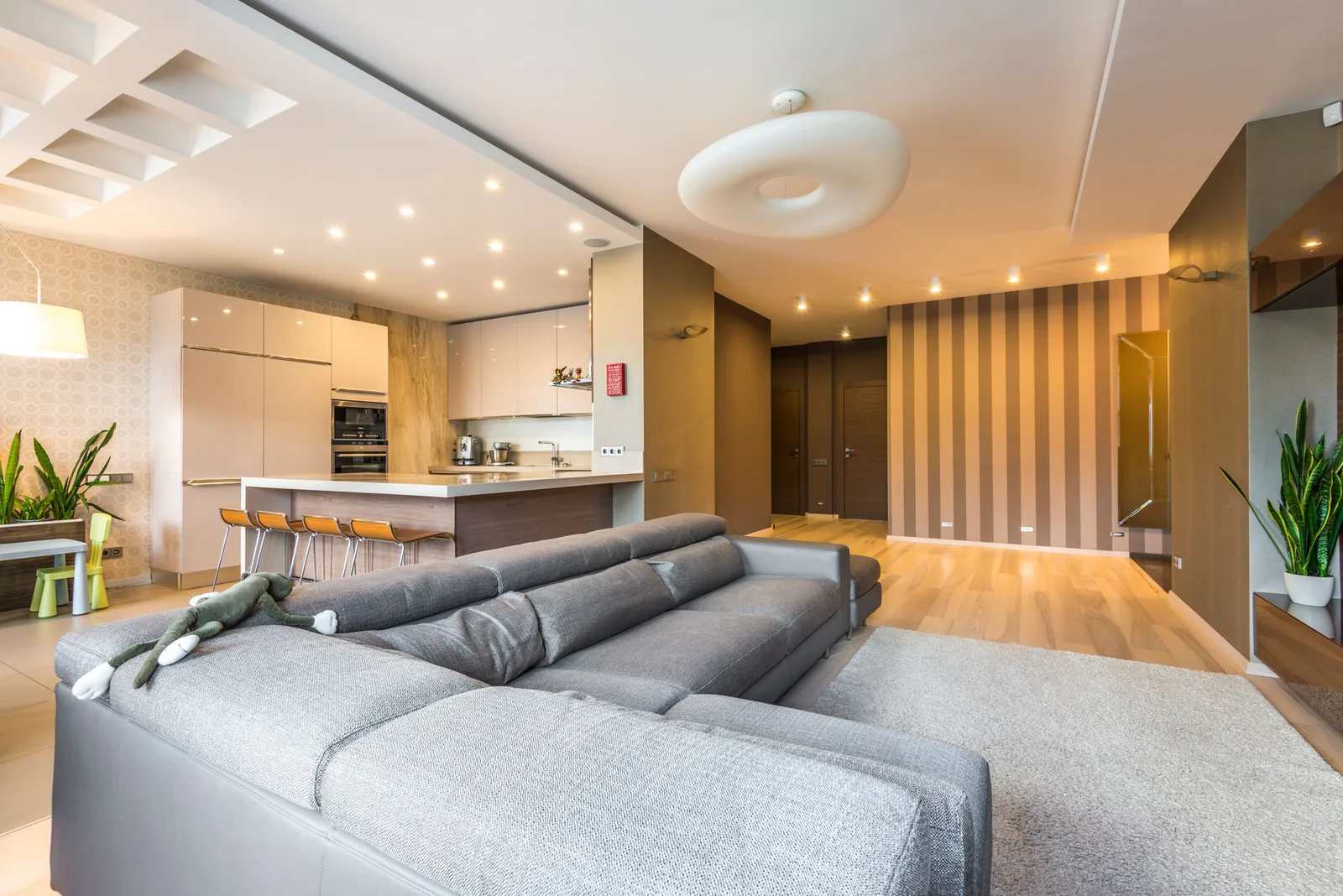 Open concept living room and kitchen after full home renovation