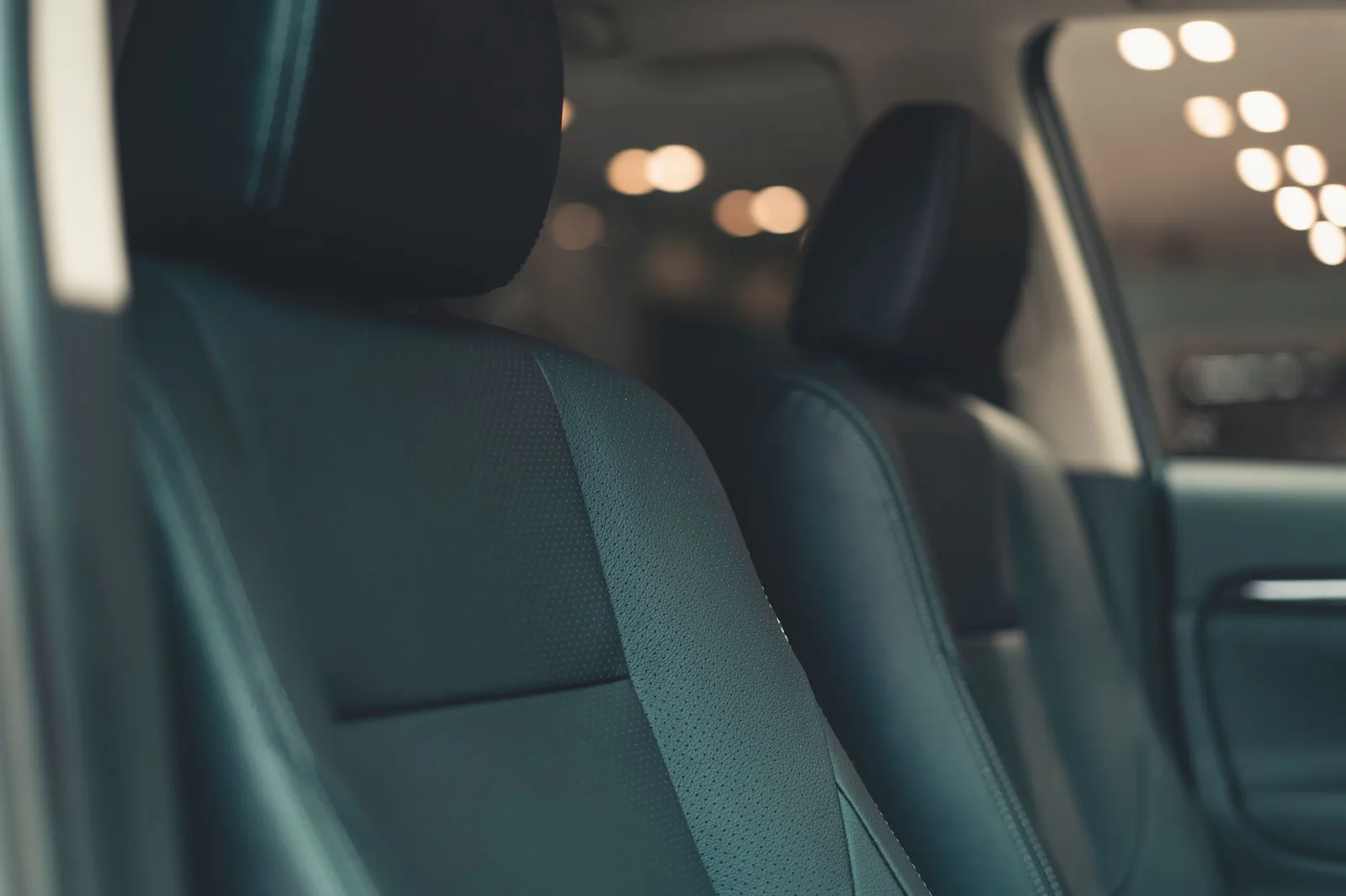 Detailed leather interior of a luxury car