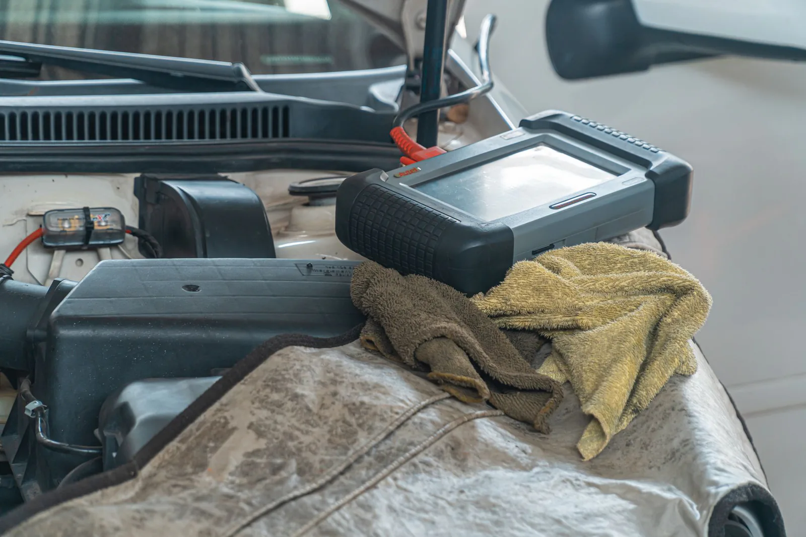 Diagnostic equipment plugged into an engine