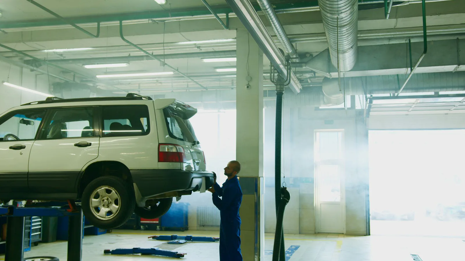 Vehicle inspection inside the service bay