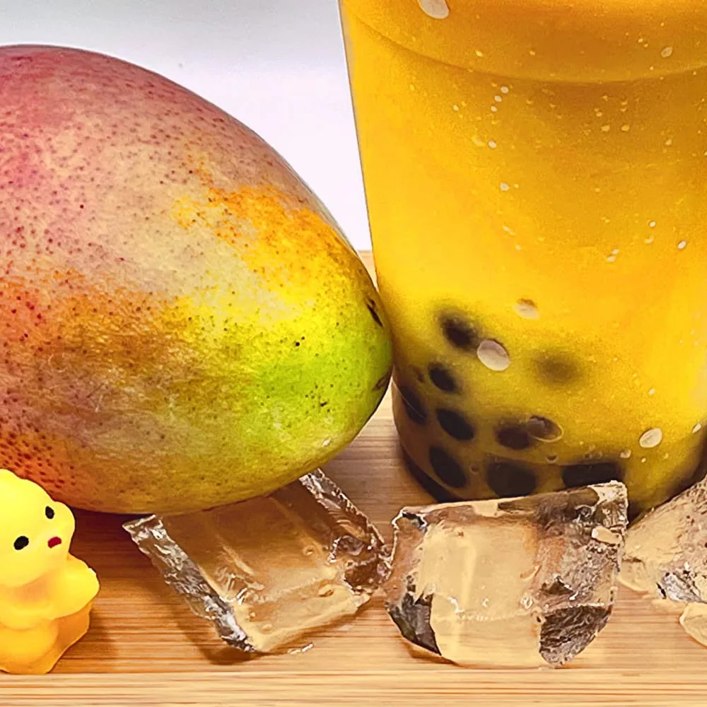 Mango slushie in a clear cup