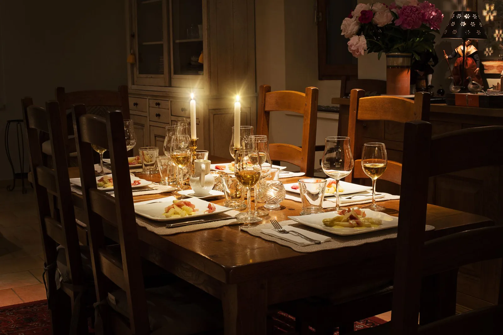 Evening table setting beside the water